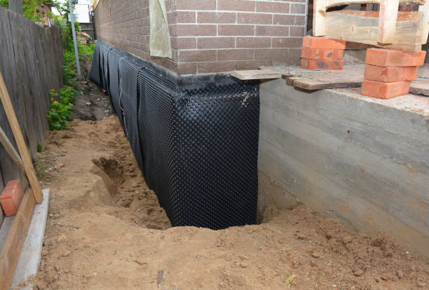 Happy homeowners after waterproofing job in Oakville